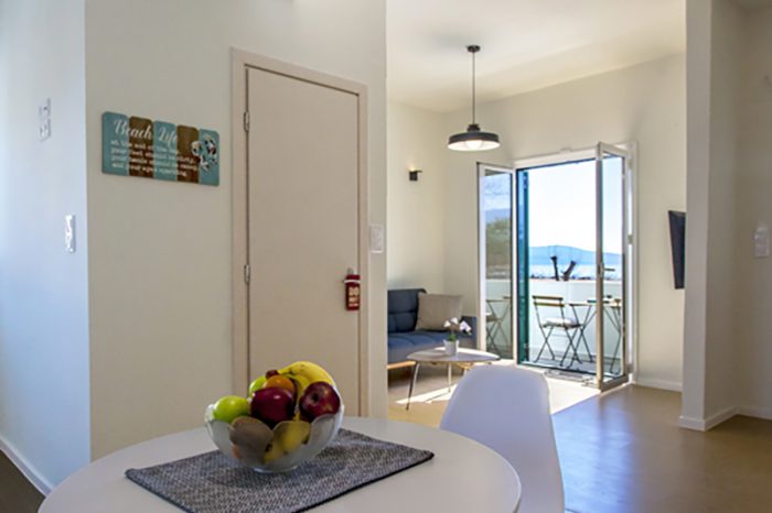 ligiabay-seafront-apartment-two-ground-floor-lefkada-greece-luxury-furniture-dining-area
